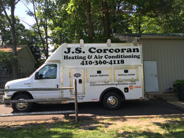JS Corcoran Heating & Air Conditioning​ Work Van
